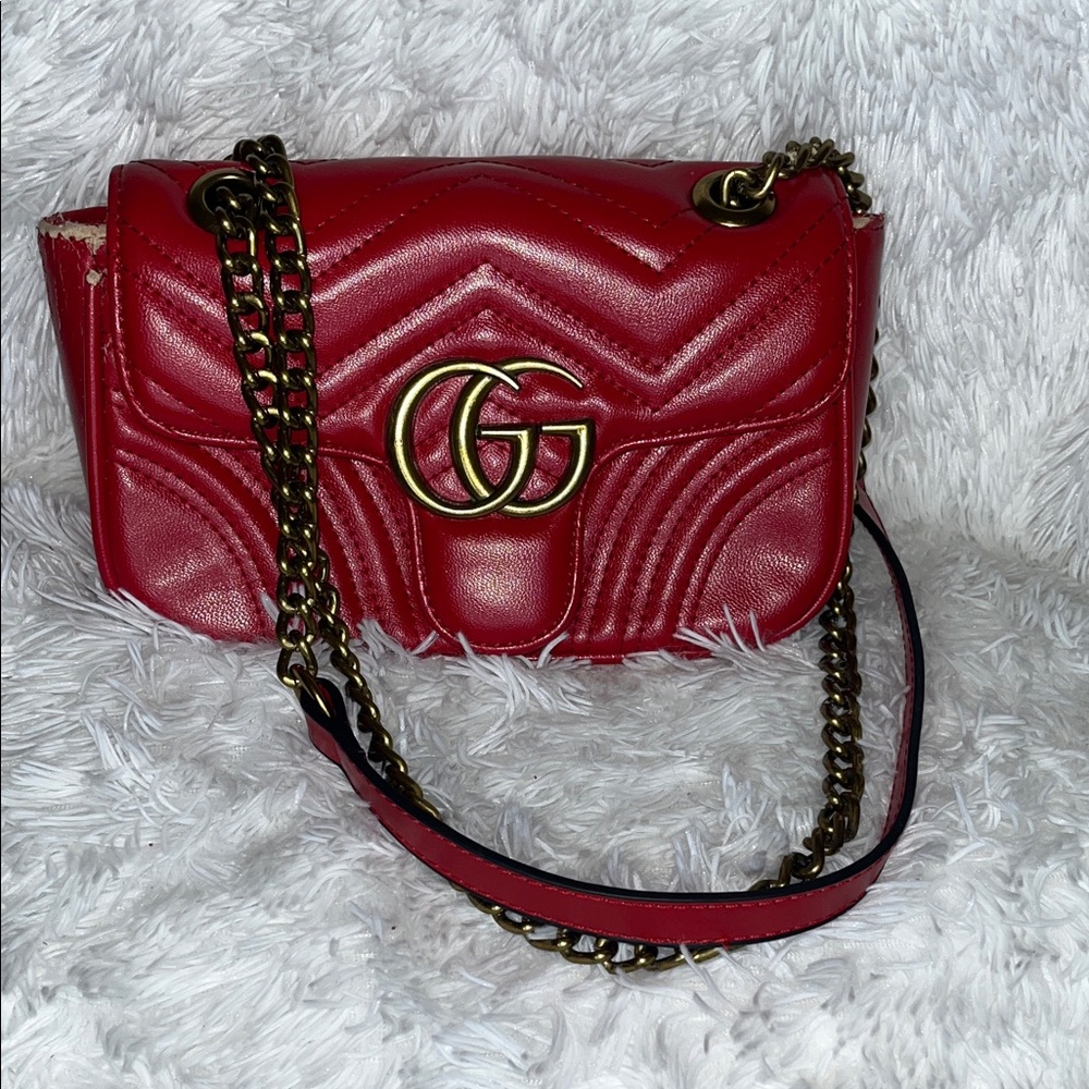 Gucci GG Marmont Matelasse’ Mini Red Leather Crossbody Bag with Gold Accents